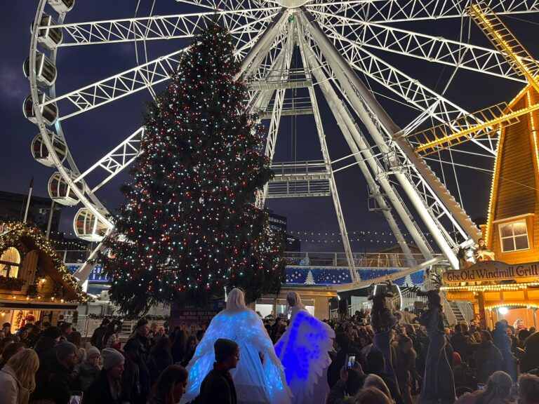 Christmas lights switch on.